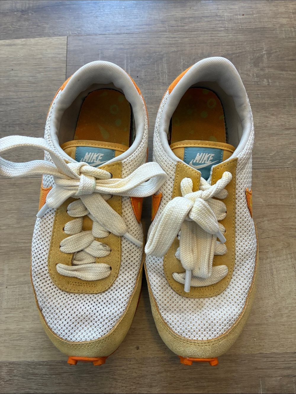 Nike women’s Retro Runner Sneakers in White and Mustard Yellow